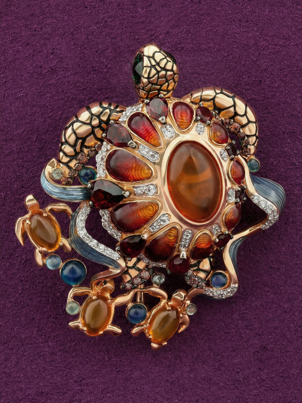Брошь из золота c эмаль , фианитом, гранатом и янтарём
