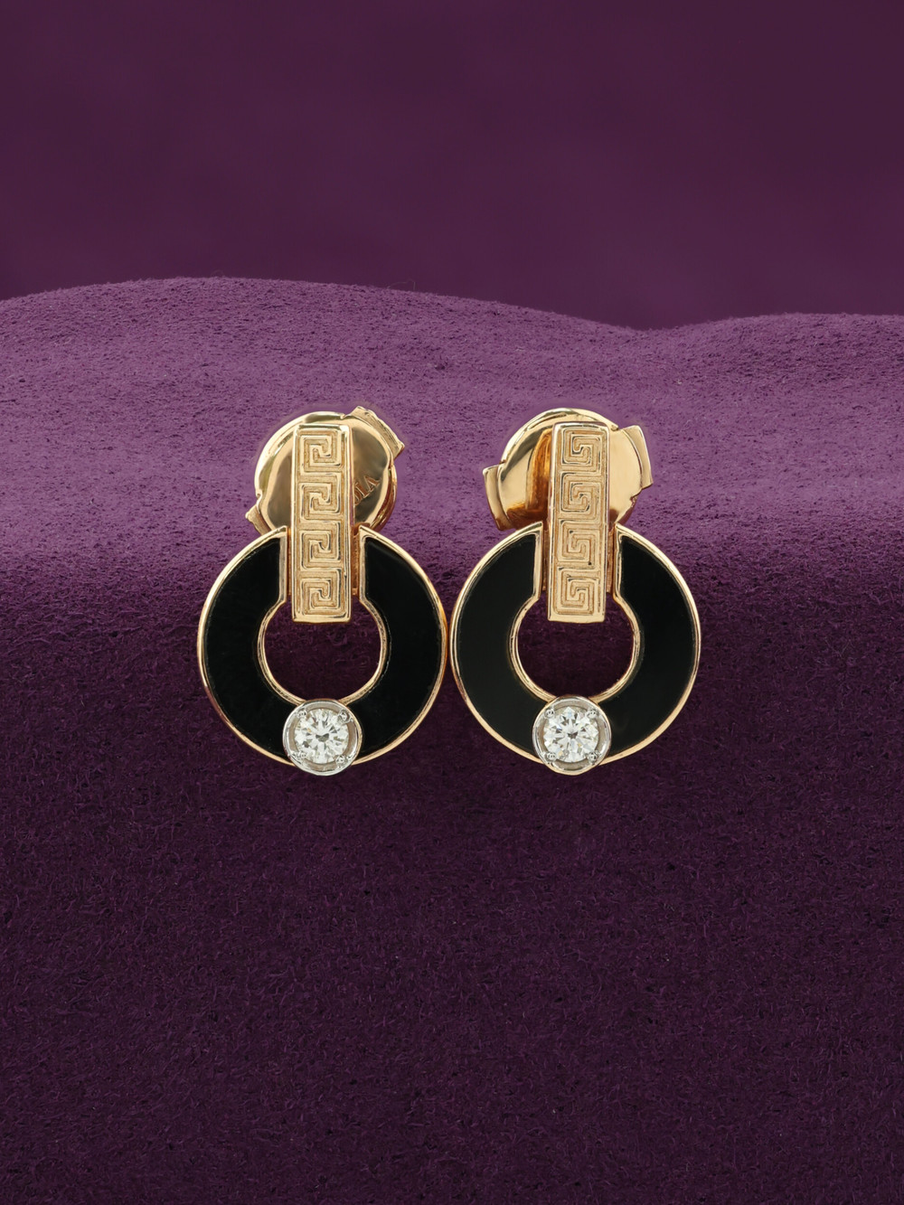 Серьги из золота c бриллиантами и ониксом