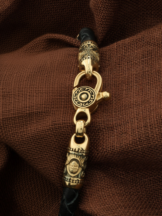 Браслет из лимонного золота c кожаным шнурком и ониксом