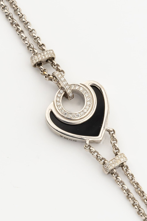 Браслет из белого золота c бриллиантами, ониксом и перламутром