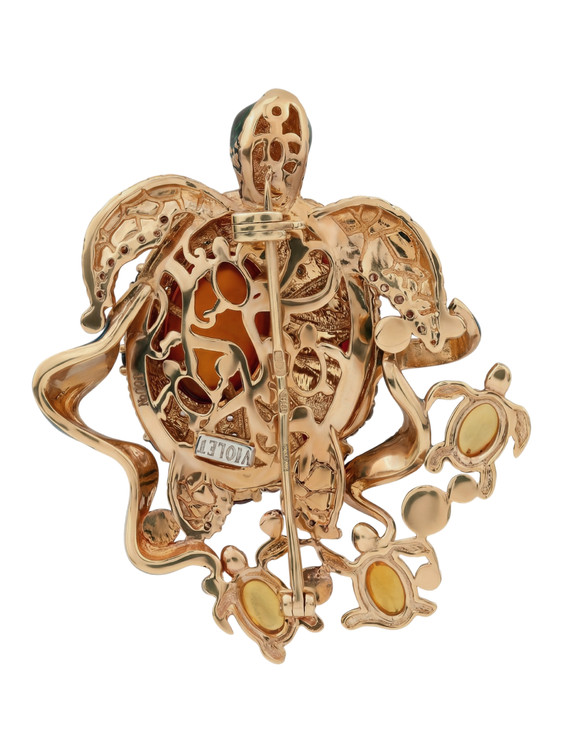 Брошь из золота c эмаль , фианитом, гранатом и янтарём